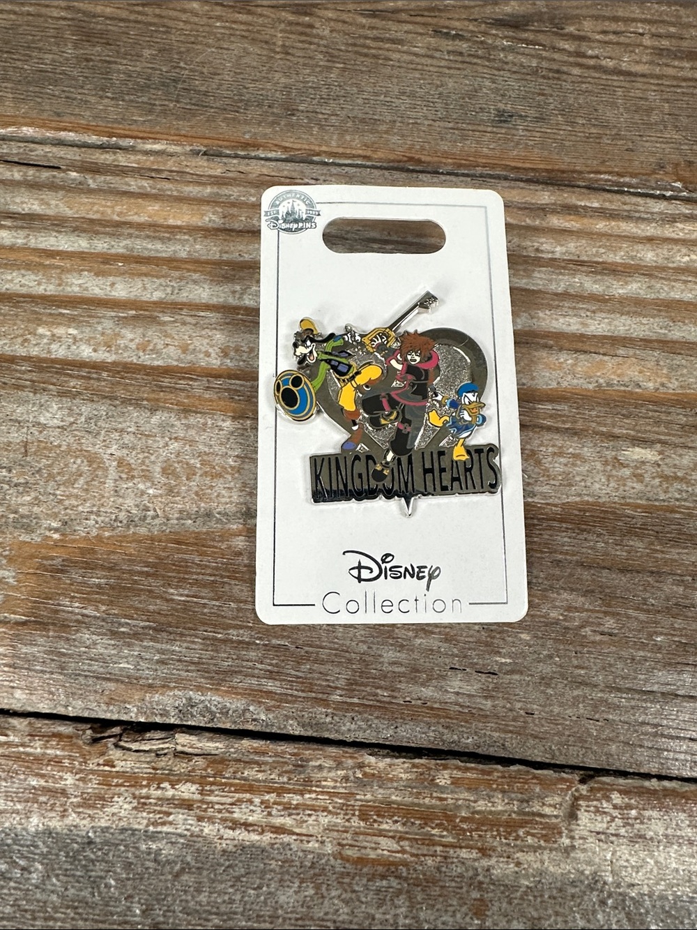 Disney Kingdom Hearts Enamel Pin - Red, Yellow, Blue, Black
